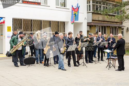 Image of Anapa, Russia - March 18, 2018: Performance of the symphony orchestra in front of the library building in Anapa, at the presidential elections in Russia