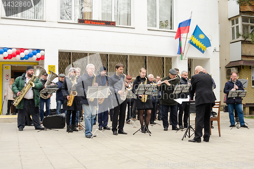 Image of Anapa, Russia - March 18, 2018: Performance of the symphony orchestra in front of the library building in Anapa, at the presidential elections in Russia