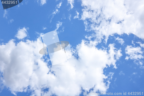 Image of blue sky with white clouds background