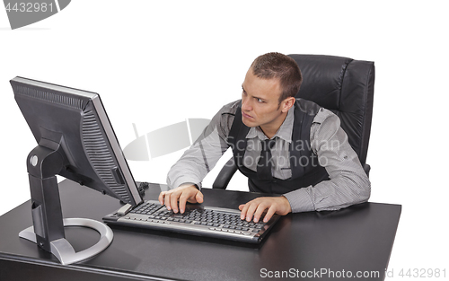 Image of Young Businessman Working