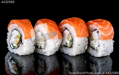 Image of Sushi roll Philadelphia in row rotated