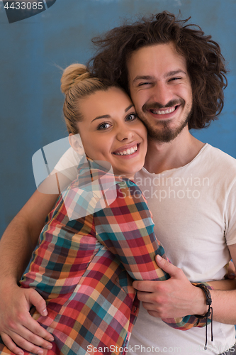 Image of couple in love  over color background