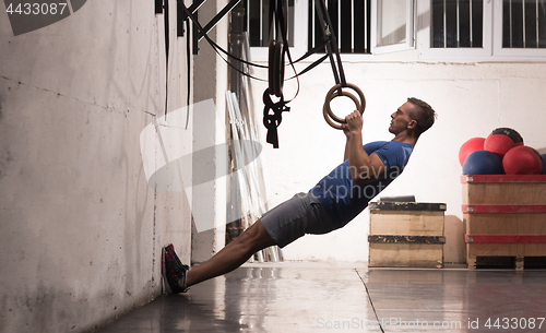 Image of man doing dipping exercise