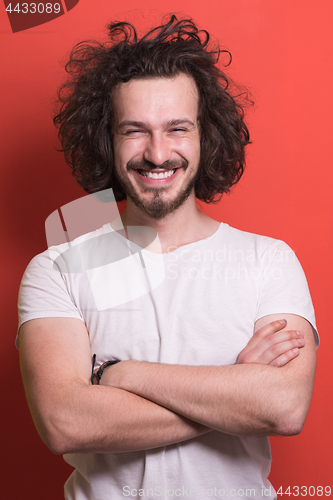 Image of young man with funny hair over color background