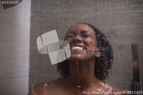 Image of African American woman in the shower