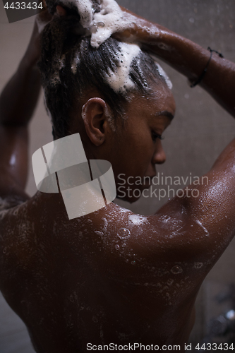 Image of African American woman in the shower