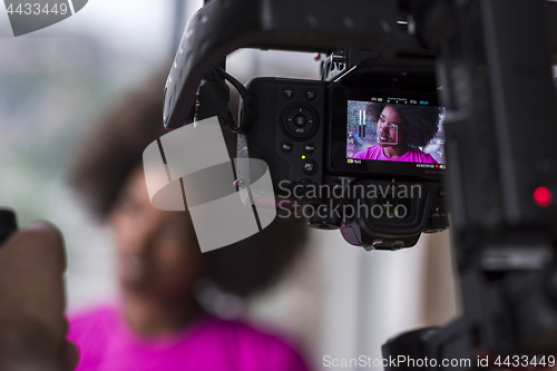 Image of african american woman using tablet