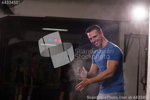 Image of Gym Chalk Magnesium Carbonate hands clapping man