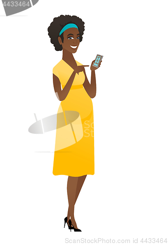 Image of African pregnant woman holding a mobile phone.