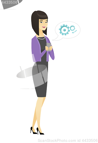 Image of Asian business woman holding a mobile phone.