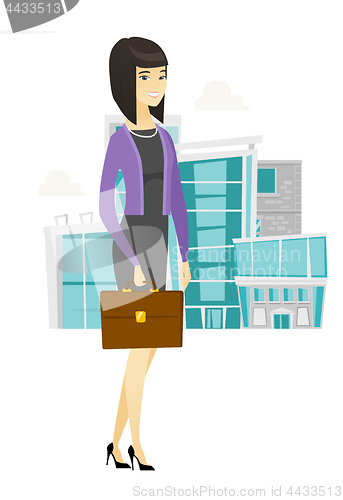 Image of Asian business woman holding briefcase.