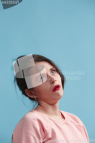 Image of Beautiful bored woman bored isolated on blue background