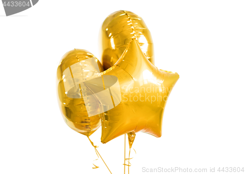 Image of close up of helium balloons over white background