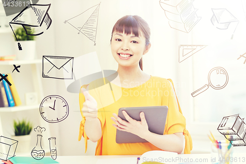 Image of happy asian woman student with tablet pc at home