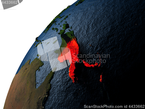 Image of Papua New Guinea in red on Earth at night