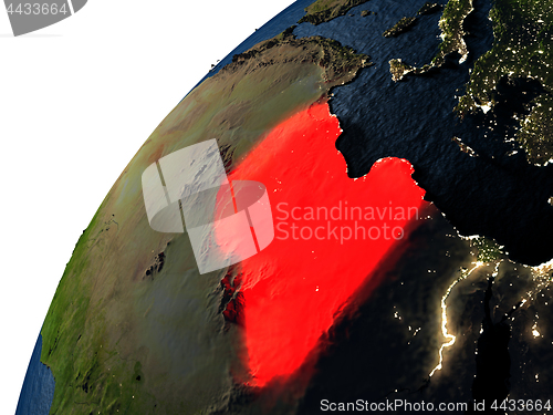 Image of Libya in red on Earth at night
