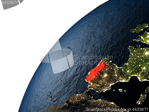 Image of Portugal in red on Earth at night