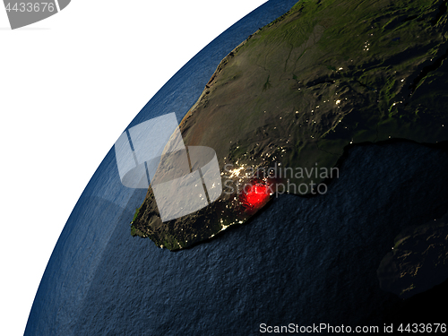 Image of Swaziland in red on Earth at night