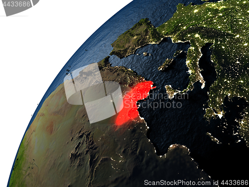 Image of Tunisia in red on Earth at night