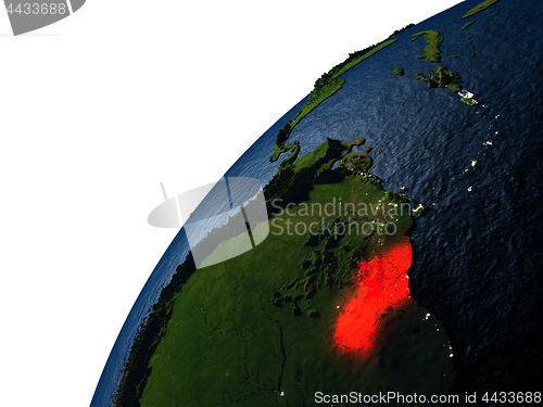 Image of Guyana in red on Earth at night
