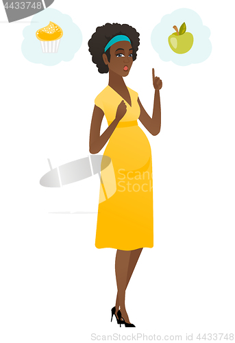 Image of Pregnant woman choosing between cupcake and apple.
