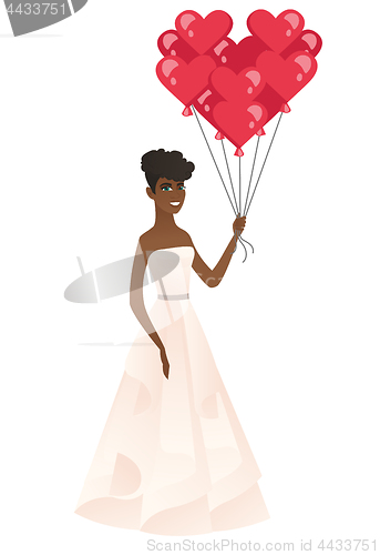 Image of Bride with bunch of heart-shaped red balloons.