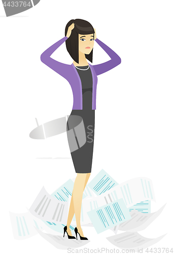 Image of Stressed business woman having lots of work to do.