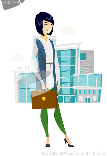 Image of Asian business woman holding briefcase.
