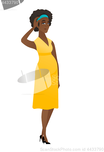 Image of Young african pregnant woman scratching her head.