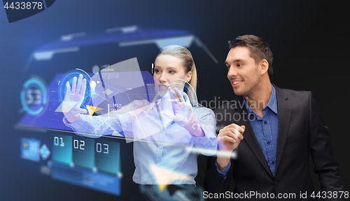 Image of businesspeople with navigator on virtual screen