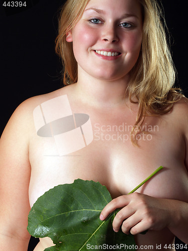 Image of Plump young woman with fig leaf covering breast