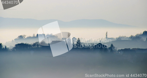 Image of Small village with in the foggy horizon