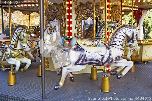 Image of Old fashioned french carousel with horses