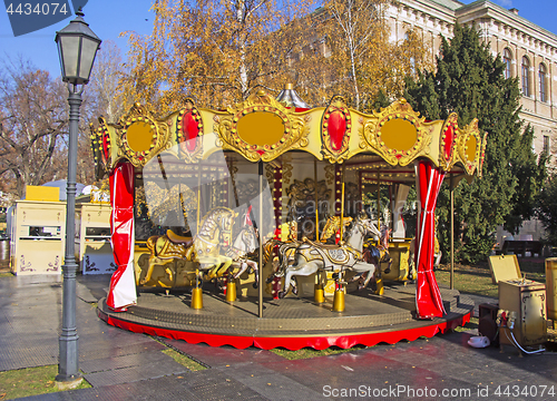 Image of Old fashioned french carousel with horses