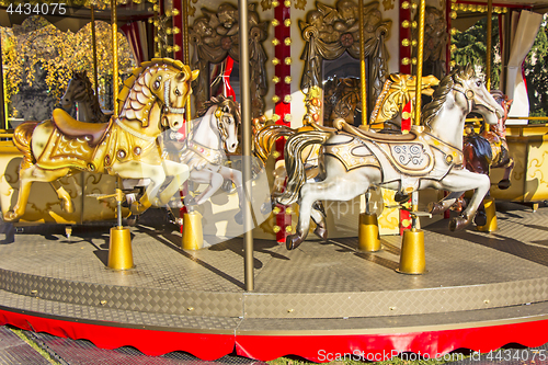 Image of Old fashioned french carousel with horses