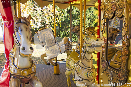 Image of Old fashioned french carousel with horses