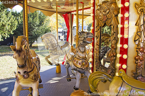 Image of Old fashioned french carousel with horses