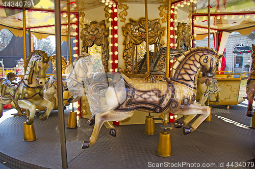 Image of Old fashioned french carousel with horses