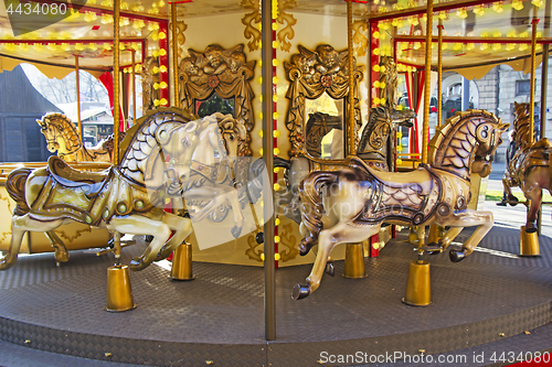 Image of Old fashioned french carousel with horses