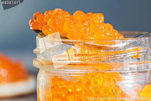 Image of Macro shot of red caviar on jar