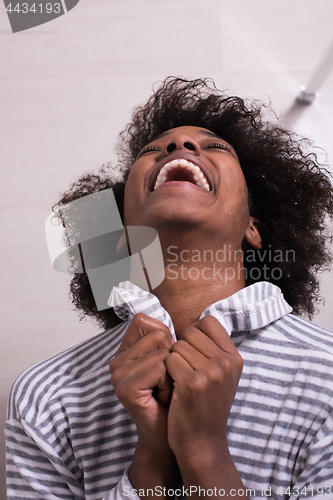 Image of beautiful black woman wearing  bathrobe