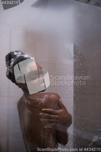 Image of African American woman in the shower