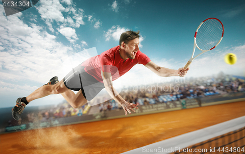 Image of The one jumping player, caucasian fit man, playing tennis on the earthen court with spectators