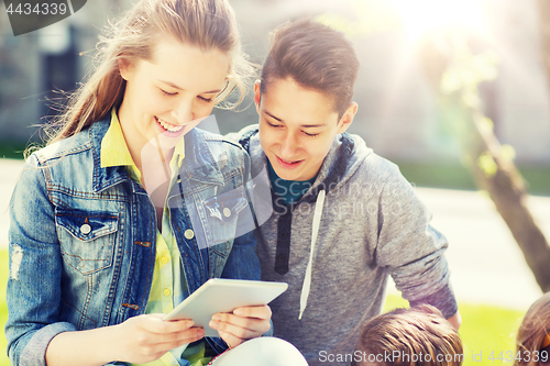 Image of group of students with tablet pc at school yard