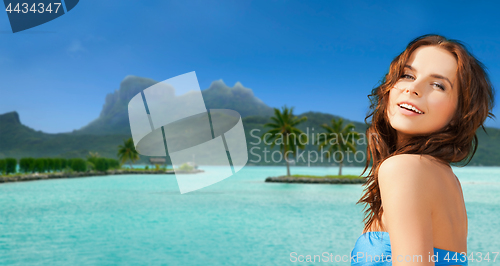 Image of happy woman in bikini swimsuit on bora bora beach