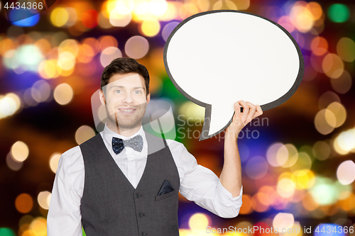 Image of man with blank text bubble banner over lights 