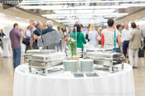 Image of Blured image of businesspeople at coffee break at conference meeting.