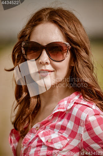 Image of Girl with sunglasses