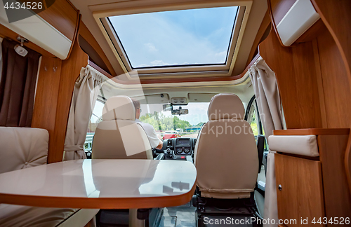 Image of Man driving on a road in the Camper Van RV