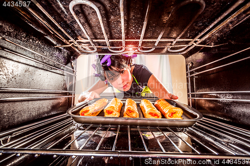 Image of Cooking in the oven at home.